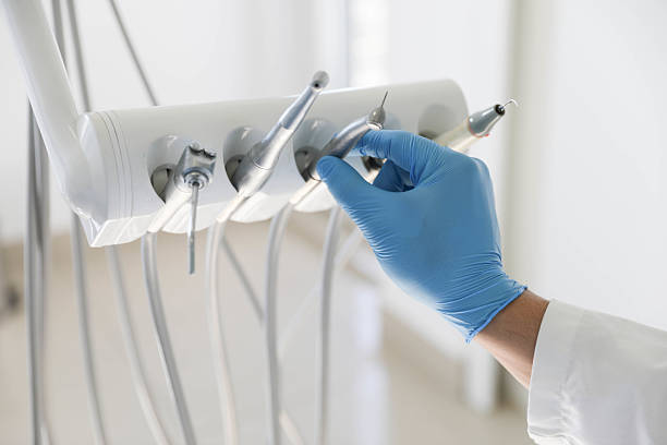 Professional Dental Implants technician working in Madison County County, NC